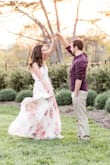 I purchased this dress for my engagement photos, and it was beautiful! However, the top of the dress caused some issues. The snap is quite flimsy and popped open if I took a deep breath in. I ended up sewing in an extra hook-and-eye closure, which helped keep it shut! The top still does move around a bit, and I had to use lots of fashion tape and keep adjusting in order to hide my bra. If I was wearing this to an event, I would probably go braless. The length was only slightly long on me (5'9", no heels), so I did not get it hemmed. - Amanda B.
