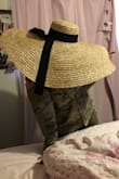 The Hat is HUGE! Just how I like it . I have eczema and I hate the sun on my skin. Just perfect . Only down side is that when it gets windy the hat will blow off your head and it came a little chipped ; however, great hat! Happy I bought it . - KhadÄ«jah S.