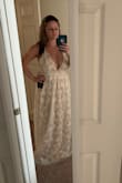 The dress was ok and def could have been worked with but I just didn't feel comfortable in it. It has A LOT of material, 3 layers. It is more beige than blush as the picture shows. It just was not too flattering on my shape. The layers of material made me appear wider than I am. In the pics you can see how I was going to alter it to be more fitted before deciding to return it. It is very long even with 3" heels as well so leave time for alterations. I also purchased the breast lift tape (not used in the pics) and that did help the top to be more flattering. Just not for me. - Sheri H.