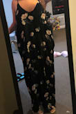 Normally would have gotten the M/L option but glad I read reviews and got the S/M! I'm about 5'3 and was pleasantly surprised with the length, it hit right at my feet but didn't touch the floor.  Overall very cute dress, but the hip area does come out and makes you look wider. I'm deciding to keep it though and I'll just do that trick that another reviewer said to do with the pockets! - Olivia L.