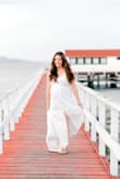 Ordered this dress a size up (medium) to use for my maternity shoot and it could not have worked out better! - Brianna H.