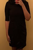 The material is stretchy so it's a little snug but it's well made and a nice thick material. Very appropriate for professional use! If you have larger arms, then it will stretch and fit over them but might look tight. That's just a personal preference thing though! - Meg L.