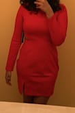 The color is VERY bright red but the slit at the bottom and the shape of the dress is so flattering. The cutouts on the side are a little large but everything works together! - Meg L.