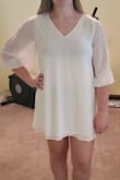 Fits very comfortably, nice and light material. Even with heels on it wasn't too short. - Cheyenne G.