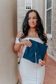 As someone who is naturally petite and struggles with sizing, I never get excited when I order new clothes because I know that sizing is always an issue. This dress is absolutely beautiful! The slit was in the perfect location, not too high or too low, for someone my size! The overall fit was absolutely perfect and it made for some beautiful college graduation pictures. It's classy and great quality! - Madisyn W.