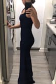 I love this dress.  I think the sweetheart neckline is always slenderizing and the material really sucks everything in. It is certainly a great dress to show off your body but covers enough to be classy). 
I tend to be between sizes xs and s. And the xs fit me best in this dress. 
The top needs to be taken in a bit. I don't have cleavage and think the dress would be slightly more flattering if I could fill out the top more.
I also like the shade of navy. It's a little more of a true blue than what is captured in the photo. - Natalie P.