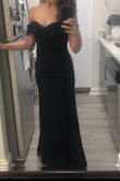 I ordered this is s and xs because I tend to be between sizes. I could not get the xs zipped up over my ribs so I am keeping the small but having it taken in a bit on top. I think the neckline is super flattering and classy. I like the way it hugs my waist and hips. I ordered a lot of dresses off lulus as potential options for a black-tie wedding and decided that this one is my favorite! :) - Natalie P.
