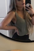 Love this top so much I've bought it in both colors cream and green! Perfect length crop (hits me just below the belly button) and the exposed back is the cutest detail. I wear it without a bra but could use pasties if wanted. Bought both in XS. Would highly recommend! - Billie A.