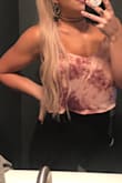 I'm loving the tie die fad and this top fits right in. I usually sit between a XS and S, (I'm 5'2" and about 125) and ordered a S. Could have almost sized up to a medium due to being tight around the chest but is manageable (I have a BA and am a 32 DDD). On the shorter side for a crop top, doesn't cover belly button. - Billie A.