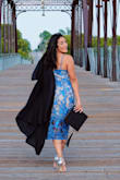 Dress fits true to size, is breathable and the fabric is great! Loved it for my grad photos. - Gisselle E.