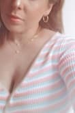 The necklace a is a nice soft touch to finishing your outfit. It did tangle just a bit for me but not crazy. Very pretty. - Daniela Z.