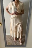 The dress is very flattering, true to size and color. - Nancy J.