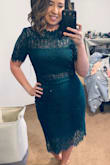 This is a wonderful dress! Incredibly comfortable and flattering. Shows just enough skin without being too revealing. The lace is perfect and you can even wear a regular nude bra with it! I got a large and it fit me surprisingly well. It is a little large in the arms for me, but that's a fit issue I have with all dresses (too big in the hips!) if you're between sizes, I would say size up but the material does stretch a little. - Amy M.