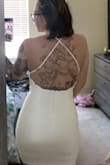 This dress fits perfectly I love it! It's very snug in all of the right places. The only thing is that it's hard to put on. Just over the head though. - Victoria F.