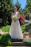 Unfortunately the size 4 I ordered was too small; however, I was able to get my hands on a size 6. It fit PERFECT! The only thing is it was too long on me, even with 2" heels. I had to get 3" removed. This dress was perfect for my small wedding ceremony yesterday. Everyone loved it and thought it was my wedding dress! I am saving my big wedding dress for our postponed celebration, but this dress made me feel like a bride! It was gorgeous and was very comfortable to wear. - Jennifer H.