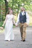 We had to postpone our wedding due to covid and I had to get a dress fast! I was so impressed with how quickly I got my dress, I paid $9 for shipping to get it a bit faster but wow I got it in 2 days! I measured my bust, waist, and hips and went off the measuring guide and the large fit my very well except for the bust BUT I don't really have any soooo I was expecting that! Other than that it was a perfect fit for my waist! I just needed a hem and had the chest area taken in! The dress is not see through at all! I was so happy cause I forgot my white undies and ended up wearing bright pink but no one could tell! I love the side of the dress and detail under the arms, it is very slimming ! - Jessica O.