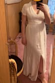This dress is cute but the waist was so tight I could barely get it zippered. I order an XS but should have ordered a S. - Jenna C.