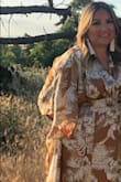 This dress is beautiful! From the color, material and comfort, you need to get it! It does run a bit large. Thankfully, from the previous reviews I did get a M. I love how flown and flattering this dress is. Love the neutral color of the dress/print as well! - Janelle P.