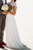 I had no idea where to find my wedding dress, then with the covid-19 everything was shut down. 
I was skeptical at first but it was my only option. It fit just perfect, it is of good quality and so affordable!! It has some pink but it looks elegant and modest. I couldn't asked for something better. - Rossy R.