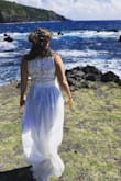 I'm petite at 5'2" with a medium rib cage size. Other than being a bit long, it fits true to size. Just a small alteration for length, and because I have a short torso, a bit of an alter to the top. Other than that, it was a dream wedding dress. Flowy and lightweight, this dress was perfect for the sunburn I had and the tropical climate in Hawai'i. - TIA R.