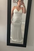 I ordered multiple dresses for small wedding ceremony after wedding was postponed. I loved this dress so much but my stomach didn't look very good in it and you could see through the fabric to my belly button. The back buttons and lace area are gorgeous and have a real wedding dress vibe. - Alexandra J.