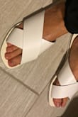 Size is true, I'm a size 6 but They are on the Rough side and they are not comfortable at all. I bought them to look cute around the house but I can't wearing for longer then 20 minutes idk if it's because they are so flat and hard or what but the material feels like it can cut my skin if I try to walk longer in them. I wouldn't recommend these. - Jessica S.