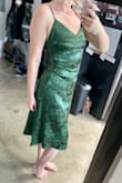 After reading reviews saying this dress was big in the bust area, I ordered a size smaller than what I normally wear. It's a little tight but more flattering than if it had been too big, I think. Otherwise fits perfectly and pretty flattering! - Whitney H.