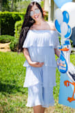 I absolutely love this dress! I wore it for my baby shower and got so many compliments on it! Everyone wanted to know where it was from. I read the reviews and a lot of people mentioned it ran large. So, being pregnant, I was nervous on sizing. Normally I'm a small in everything but I've been sizing up to medium in most things. I am glad I did NOT size up in this dress because even being pregnant, the small fit me PERFECT! Plus, I can wear it after baby, too! - Alexis A.