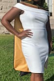 Perfect mix of classy and sassy! Looked absolutely beautiful in my graduation photoshoot. Definitely a snug fit, but I wouldn't order up (maybe just hit the gym). - Colby W.