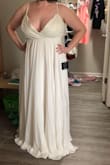 This is a beautiful dress, but I wasn't in love with it. There isn't any support at all if you have a large chest. A strapless bra can be worn with it, but it will show on the bottom of the chest and would need to be pinned. It was also way too long and I didn't have time to have it hemmed. - Jessica R.