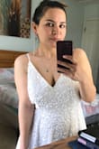 Dress was perfect! It was a little bit larger but it was my bad because I didn't measure! I thought my normal size would fit. You might also need a lift bra. - Gulcin U.