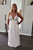I've been wanting a white maxi dress for awhile. One that isn't see through. I'm wearing leopard underwear, just to show that the material is thick enough not to show. Also no bra needed with the way I tied it. Hubby wasn't around to help tie it the way the model was wearing it in the pic. I'm very wide hip and large booty, so if you're a curvy girl like me you shouldn't have a problem. I don't think anyone will be disappointed with this dress at all!! - Christine K.