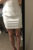 This dress fits very weird... it's longer in the front than in the back and it is VERY baggy only in the lower stomach area. It's like a pouch and the material literally hangs over the dress like it has a beer belly lol. I'm not even sure that getting it tailored would help. I said "runs a little large" but it doesn't really fit into any of those categories.. it's just weird. - Aimee W.