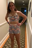 This outfit fits like a glove!  I was looking for something to wear to a summer party and this is perfect.  The shorts have a little stretch and the top can be tightened or loosened with the tie in the back to make it flatter your figure. I love it! - Serina D.