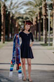 The dress fit snug and turned out great for graduation pictures. The fabric is thick so the scalloped neckline won't come undone, the quality feels very nice. I really liked this dress! - Cynthia C.