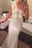 The dress is a great thick material, but it runs a little large. I ordered a size small and returned for an extra small for a tighter fit. Other than the sizing I love this dress! - Kennedy B.