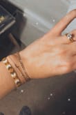 looks so cute stacked with gold jewelry for summer! - Sarah C.