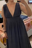 The waist fit well, so I wouldn't order a smaller size but the bust was SO big. I ended up returning it because there was absolutely no way I'd make it through a night without a malfunction. I also feel like because the straps and bust are so wide and I didn't have the chest to fill it out it made my whole upper body look a lot wider than it actually is. Definitely not recommended for women with small chests! - Shelby F.