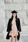 Bought this for my graduation, and I love it! Fits a bit large in the shoulder and bust area, but I think an xs would have been too small, so I'm happy with it. No complaints otherwise! - Braydee B.