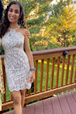 First of all, I want to say that this dress is absolutely GORGEOUS! The lace is so beautiful and delicate, and the neckline is very flattering. The material is also thick enough that I didn't need to wear a bra. What I didn't like was that it was a bit loose around the armpit area as you can see in the pictures and it can end up looking a little saggy around the area sometimes. Also, the zipper in the bag isn't the greatest quality and it would always get stuck/would be hard to pull the zipper up where the waistline stitching is. Otherwise I loved it, I felt very elegant and wore it for my "graduation" and grad photos. - Nikita T.