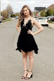 This dress EXCEEDED my expectations. I wore it for my birthday and I think the fit of it was what made that day so special. The adjustable straps were a live saver and it fit perfectly true to size. Wouldn't size up or down. The length isn't too long either and the ruffles at the bottom are the best part. - Taylor G.
