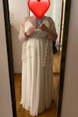 I ordered this dress for a park wedding after our original wedding was canceled due to COVID-19. It's very flowy and lovely, and looks great with accessories! - Rebecca F.