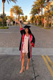 I'm on the petite side and I wore this dress/romper with 4" heels and the length was perfect! I absolutely loved it for my graduation pictures and got so many compliments on it, definitely recommend! - Lauren M.
