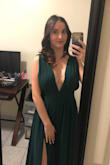 I bought this dress for a wedding in December! I loved the dress, and everyone was complimenting me all night long! It's runs a bit large especially in the boobs area! I would of probably ordered XS but didn't have enough time to exchange! I used a pin to no show so much! - Jennifer F.