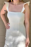 It fits perfectly!! I'm in love with this dress - Rayanna O.