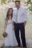 I wore this for my wedding and it was perfect. The dress fit perfectly according to the size chart. I measured myself before I ordered. I had it hemmed on the bottom and the bust nipped in on the sides to make it fit well. I wore a bra with an ivory lace bandeau that I have had for 10 years. I need the support of a bra, and the lace bandeau gave me coverage so that I felt confident and not too flashy. I highly recommend the dress! - Carlene A.