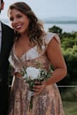 I was super comfortable with the dress. I am generally a size Medium, sometimes I can be size small. However, I had to exchange this dress from size M to small.  I was definitely a Small, the medium size was too big and too long for me.
It was ideal for a warm day wedding in summer, I felt fresh during the entire night and super comfortable to dance all night!  I even kept using the top and the bottom separately in different opportunities. - Maite D.