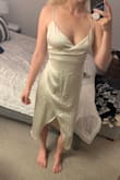 This is a stunning dress! The material is thick and of excellent quality, and the dress hugs the right places. My only complaint is a liner that comes barely to the bottom of my butt, scrunches when I move and makes that part of the dress look bunchy. Debating if I want to take it somewhere to have to removed. - Cassidy K.