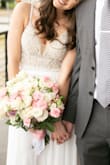 I ordered this dress for my elopement. I couldn't wear my original wedding dress since my bridal boutique was closed but this dress worked perfectly and was beautiful. I have no regrets at all about this dress. I am usually a size 4 so I was surprised the 2 fit so perfectly. The waistline of the dress where the sparkles start is not a stretchy material so you do want to get your sizing right so the waistline is as flattering as possible. - Riley N.