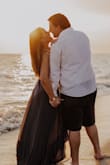 The dress is great material, it has some weight to it but it flowed beautifully on the beach for our engagement photo session. Very figure flattering and the slit is perfect. - Erin S.
